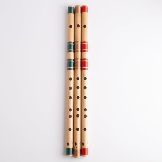 A# bansuri's in green, gold and red thread color