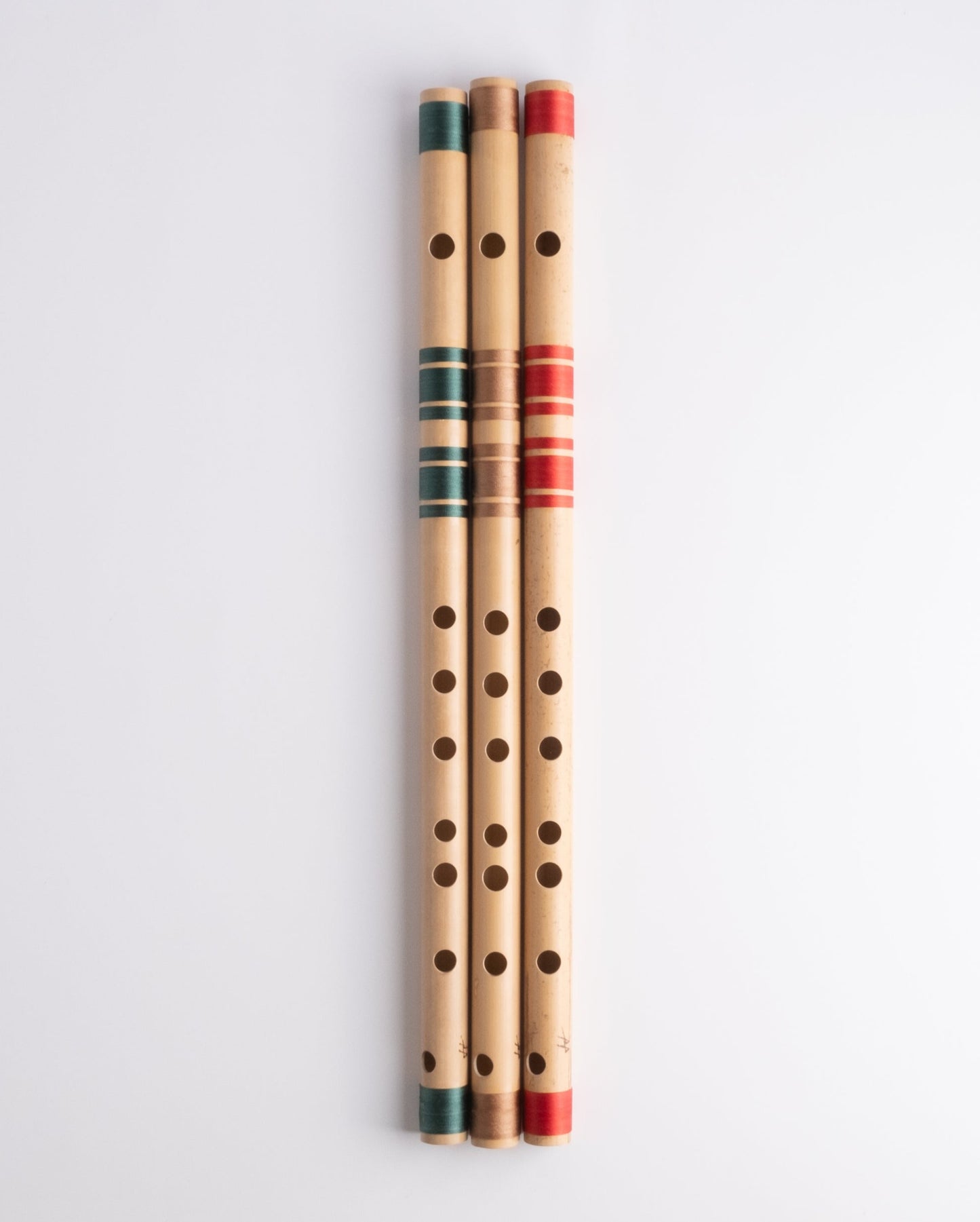 B bansuri's in green, gold and red thread color