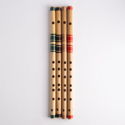 C bansuri's in green, brown, gold and red thread color