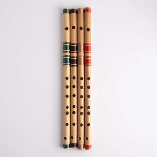 C bansuri's in green, brown, gold and red thread color